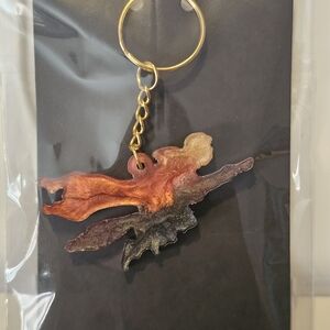 Handmade Resin Flying Figure Keychain in Orange and Black
